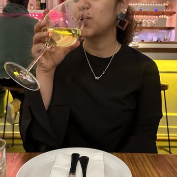 Destapas - Me sipping on wine seated opposite to the bar - Spanish Near Me - San Francisco, California Destapas - Me sipping on wine seated opposite to the bar - Spanish Near Me - San Francisco, California
