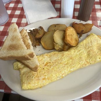 The Ugly Diner - Cheese Omelette, breakfast potatoes and toast - American Near Me - Gulf Shores, Alabama The Ugly Diner - Cheese Omelette, breakfast potatoes and toast - American Near Me - Gulf Shores, Alabama