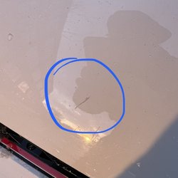 Chicago Autohaus - Photo of the hood with scratch.