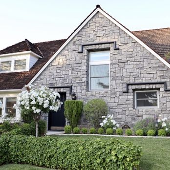 Greenscape - Side view of home. - Landscaping Near Me