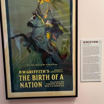 Poster House - The 1915 DW Griffith film, "The Birth of a Nation" is known as the most reprehensible racist film in Hollywood history. - Art Museums Near Me - New York, New York Poster House - The 1915 DW Griffith film, "The Birth of a Nation" is known as the most reprehensible racist film in Hollywood history. - Art Museums Near Me - New York, New York