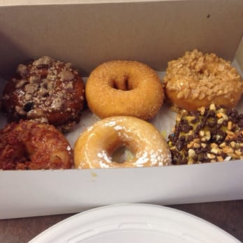 Beignets - Choc pnut butter, nico, toffee caramel bacon lemon banana (from top left to bottom right) - Donuts Near Me - Denville, New Jersey Beignets - Choc pnut butter, nico, toffee caramel bacon lemon banana (from top left to bottom right) - Donuts Near Me - Denville, New Jersey