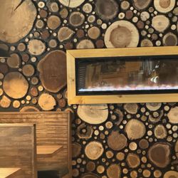 Cattleman’s Roadhouse - Wood design on back wall