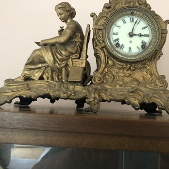 Custom Time - Antique clock . Has key to wind & every hour clock chimes in according to the time. I believe it's bronze - Clock Repair Near Me