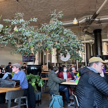 BlackStack Brewing - a group of people sitting at tables - Venues & Event Spaces Near Me - Saint Paul, Minnesota
