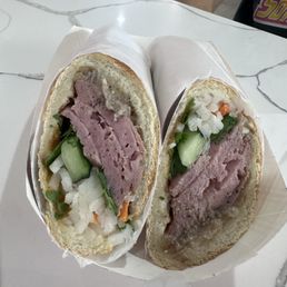 Pork sausage banh mi, added pate. Very well made and delicious