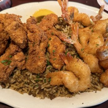 Pappadeaux Seafood Kitchen - Large Fried shrimp & chicken tenderloin plate with dirty rice. - Cajun/Creole Near Me - Austin, Texas Pappadeaux Seafood Kitchen - Large Fried shrimp & chicken tenderloin plate with dirty rice. - Cajun/Creole Near Me - Austin, Texas