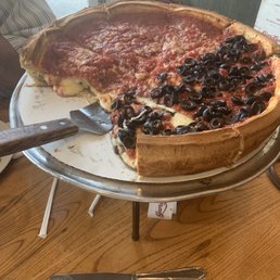 Took this picture to show how large the pizza is when compared to the knife. Took this picture to show how large the pizza is when compared to the knife.