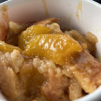 The Peach Cobbler Factory - One peach was all there was in the peach cobbler. - Desserts Near Me - Baton Rouge, Louisiana The Peach Cobbler Factory - One peach was all there was in the peach cobbler. - Desserts Near Me - Baton Rouge, Louisiana