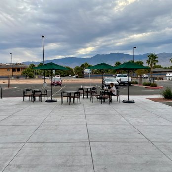 Starbucks - Outdoor seating on a cloudy morning. - Coffee & Tea Near Me - Mesquite, Nevada Starbucks - Outdoor seating on a cloudy morning. - Coffee & Tea Near Me - Mesquite, Nevada