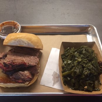 Heim Barbecue - Slice beef sandwich and a side of greens - Barbeque Near Me - Dallas, Texas