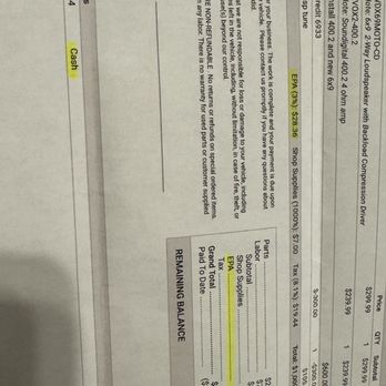 Carmil Car Audio - The invoice displays a detailed breakdown of a car audio installation service, including sections for parts, supplies, and the remaining balance. It lists specific items such as a subwoofer, amplifier, and other components, with their respective prices. The invoice also shows the total amount paid, the remaining balance, and payment method details. Highlighted totals and payment information are visible, with the invoice formatted in a typical business document style. - Car Stereo Installation Near Me - Springfield, Missouri