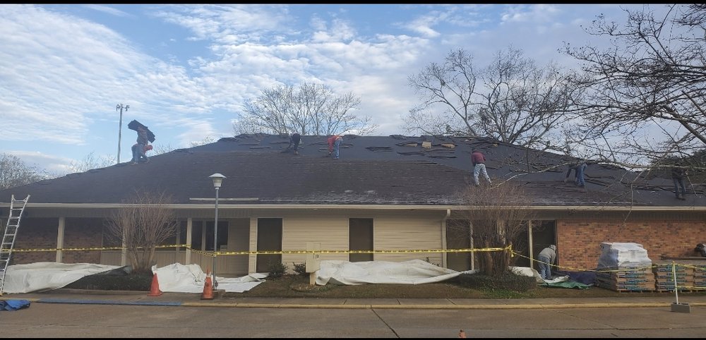 Slide of Illusion's Roofing