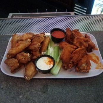 Yogi's Bar & Grill - On Gameday you can 20 wings for $15 dollars - Sports Bars Near Me - Upper Arlngtn, Ohio