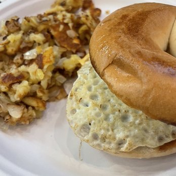 The Pines - a bagel sandwich and hash browns - Breakfast & Brunch Near Me - Greensboro, North Carolina The Pines - a bagel sandwich and hash browns - Breakfast & Brunch Near Me - Greensboro, North Carolina