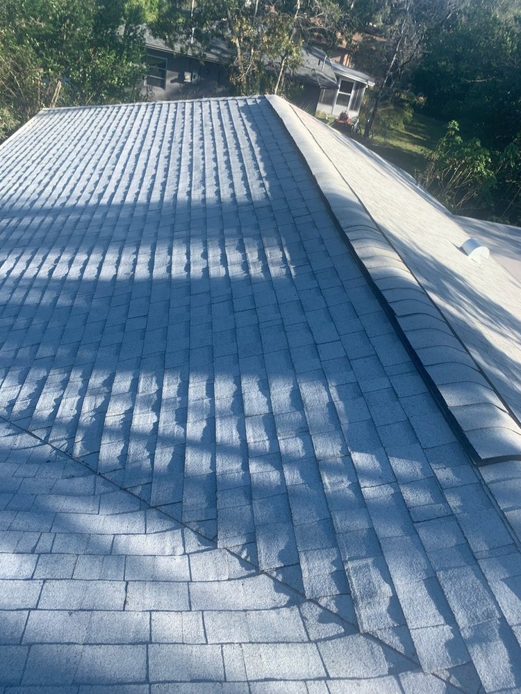 Slide of JAT Roofing