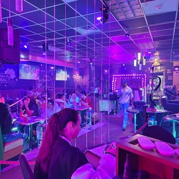 Habibi Mazzika Hookah Lounge - a group of people sitting at tables - Hookah Bars Near Me - Paterson, New Jersey Habibi Mazzika Hookah Lounge - a group of people sitting at tables - Hookah Bars Near Me - Paterson, New Jersey