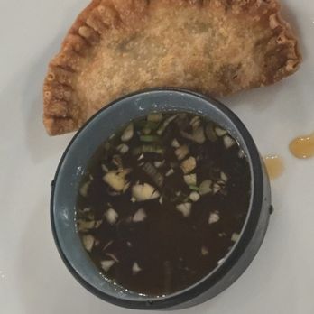 Mangosteen Grill & Lounge - Duck dumpling and sauce - Asian Fusion Near Me - Dunedin, Florida Mangosteen Grill & Lounge - Duck dumpling and sauce - Asian Fusion Near Me - Dunedin, Florida