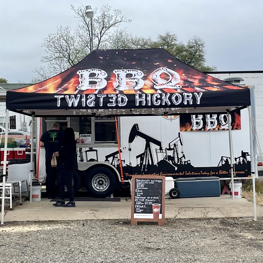 Twisted Hickory BBQ - a man standing in front of a tent - Food Trucks Near Me - Carthage, Texas Twisted Hickory BBQ - a man standing in front of a tent - Food Trucks Near Me - Carthage, Texas