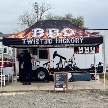 Twisted Hickory BBQ - a man standing in front of a tent - Food Trucks Near Me - Carthage, Texas Twisted Hickory BBQ - a man standing in front of a tent - Food Trucks Near Me - Carthage, Texas