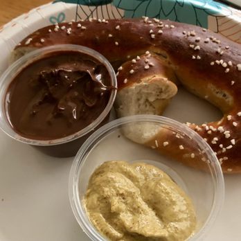 The Pretzel Bakery - My pretzel and sauces. Some of my pretzel disappeared on the way home. Oops! - Bakeries Near Me - Potomac, Maryland