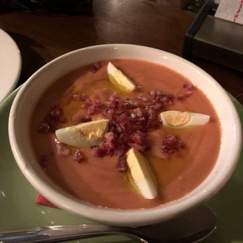 La Tana - Salmorejo - cold tomato soup drizzled with olive oil hard boiled egg (not a tapa) - Tapas Bars Near Me - Granada, GR La Tana - Salmorejo - cold tomato soup drizzled with olive oil hard boiled egg (not a tapa) - Tapas Bars Near Me - Granada, GR