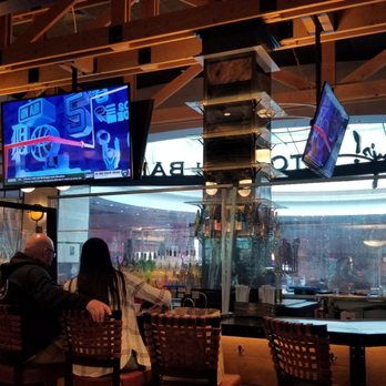 Guy Fieri's Foxwoods Kitchen & Bar - Plexiglass at bar - American Near Me - Mashantucket, Connecticut