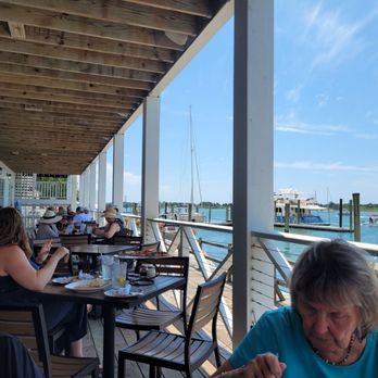 Queen Anne's Revenge - View from our table on the outside back deck. There was a beautiful breeze and shade at lunchtime. - Pizza Near Me - Beaufort, North Carolina Queen Anne's Revenge - View from our table on the outside back deck. There was a beautiful breeze and shade at lunchtime. - Pizza Near Me - Beaufort, North Carolina