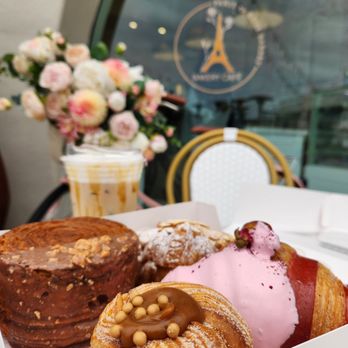 Paris En Rose - Raspberry Rose croissant, the Ferrero Rocher rolled croissant, the almond croissant, and the caramel cruffin - Cafes Near Me - Del Mar, California Paris En Rose - Raspberry Rose croissant, the Ferrero Rocher rolled croissant, the almond croissant, and the caramel cruffin - Cafes Near Me - Del Mar, California