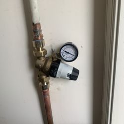 Trust Plumbing & Heating - New pressure reducing valve with gauge