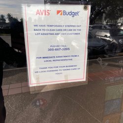 Avis Rent a Car - Sign that says you can call if not here, yeah right!