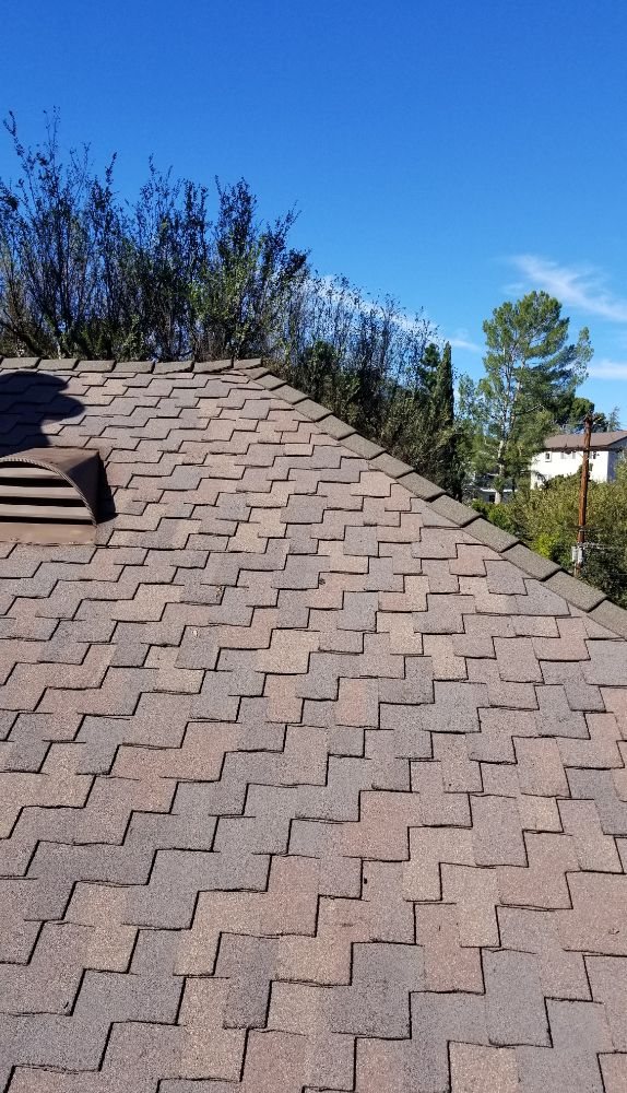 Slide of Rex Roofing