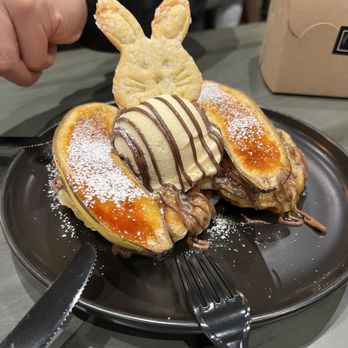 Petit Four Dessert Cafe - Banana croffle with extra Nutella topping - Desserts Near Me - Carrollton, Texas Petit Four Dessert Cafe - Banana croffle with extra Nutella topping - Desserts Near Me - Carrollton, Texas