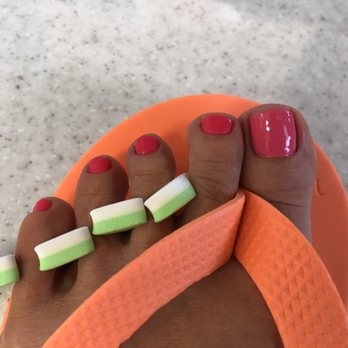 Blume Nails & Spa - Picked two hello kitty OPI nail colors. Lady kindly suggested putting one color on my big toes and the darker pink on the rest. Worked! - Nail Salons Near Me - Lilburn, Georgia
