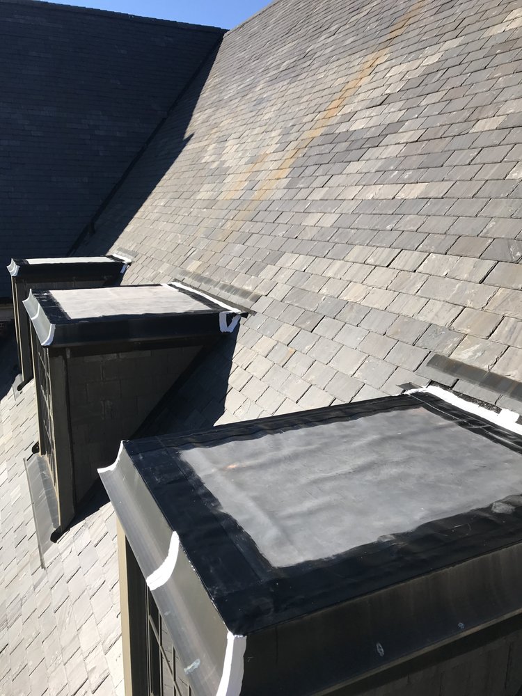 Slide of Advanced Roofing & Paving