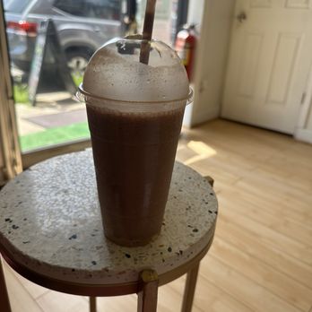 My Nutrition Place - a cup of coffee on a table - Juice Bars & Smoothies Near Me - Bellerose, New York My Nutrition Place - a cup of coffee on a table - Juice Bars & Smoothies Near Me - Bellerose, New York