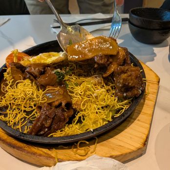 Baby Cafe - Braised beef over crispy noodles - Desserts Near Me - Boston, Massachusetts