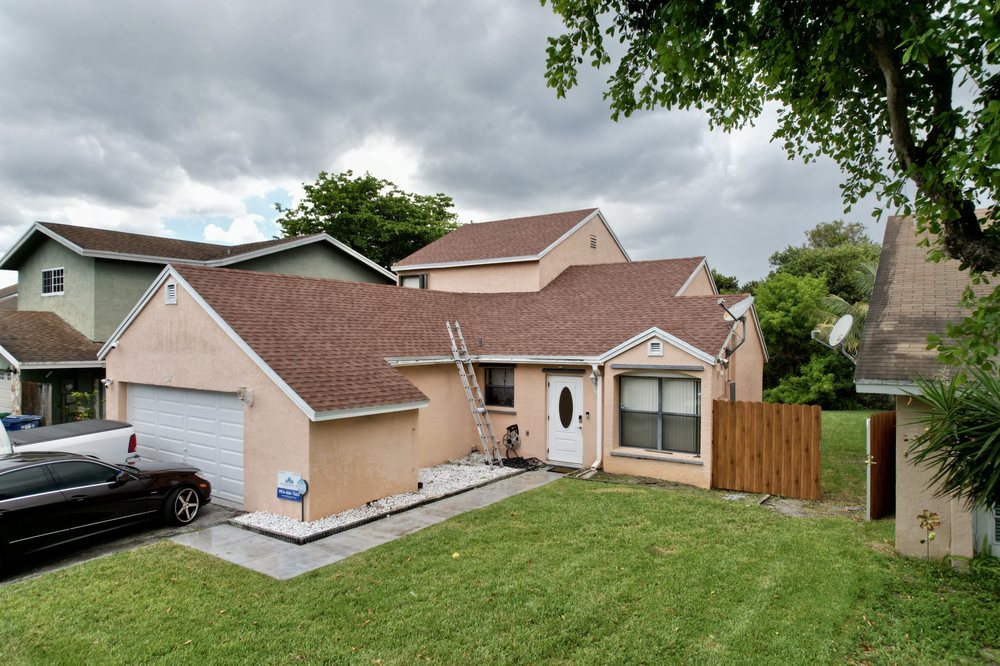 Slide of Nacs Roofing