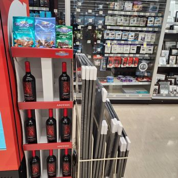 Walgreens - a rack of wine bottles in a store - Drugstores Near Me - Long Beach, California