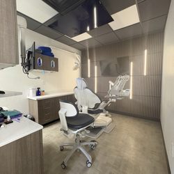 ABQ Gentle Dentistry - Each patient room has a TV screen "on the ceiling" to keep you occupied when you're laid back.