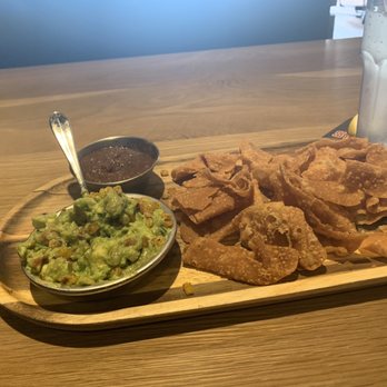 Sidecar Social - Charro Guacamole and wonton chips - Sports Bars Near Me - Addison, Texas Sidecar Social - Charro Guacamole and wonton chips - Sports Bars Near Me - Addison, Texas