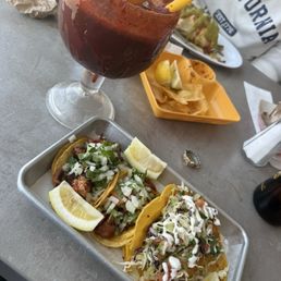 Michelada - carnitas, al pastor, shrimp taco Michelada - carnitas, al pastor, shrimp taco
