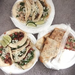 El pastor, beef, and chicken tacos and quesadillas El pastor, beef, and chicken tacos and quesadillas