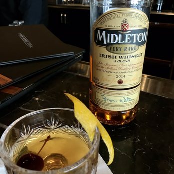 Whiskey by John Howie - Old fashioned with the bartender tempting me with some good irish whiskey lol - Whiskey Bars Near Me - Bellevue, Washington