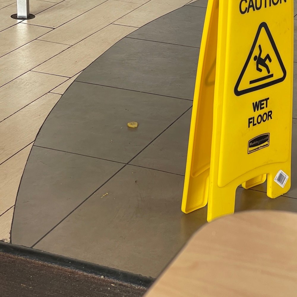 a caution sign on the floor a caution sign on the floor