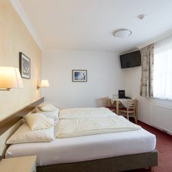 Planaihof - vom Bett aufs Brett - mitten auf der Planai - Familienzimmer