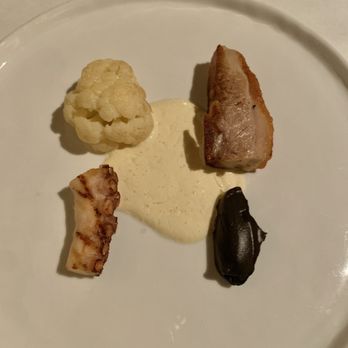 Atlas Bistro - Butter Poached Cauliflower, Pork Belly Confit, Squid Ink Cauliflower Puree, Grilled Octopus, - New American Near Me - Scottsdale, Arizona