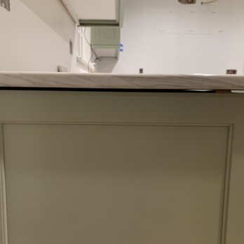 Premier Stone Fabrication - Gap from cabinet to slab is 1/4 because the slab is bowed - Building Supplies Near Me - Salem, Virginia
