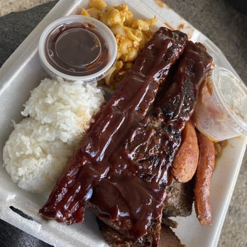 The Munchie Machine - Beef Brisket, Ribs, Sausage, Beans, Coleslaw, Mac n Cheese, Rice, nd extra BBQ Sauce. HOW IS ALL THIS ON ONE FRIGGIN PLATE?! - Food Trucks Near Me