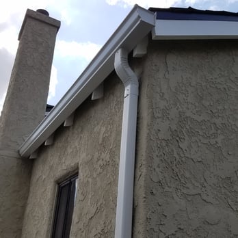 Rainbow Gutters - Side of the front of house by our chimney with its own downspout - Gutter Services Near Me - West Covina, California Rainbow Gutters - Side of the front of house by our chimney with its own downspout - Gutter Services Near Me - West Covina, California